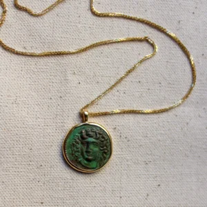 Heritage Selection - Handcarved Oxidized Copper Coin with Solid Gold