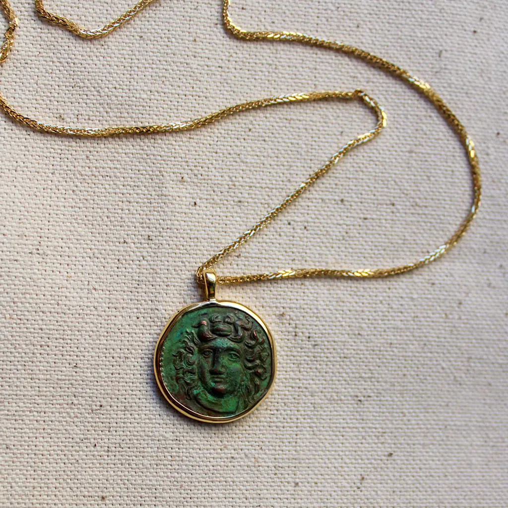 Heritage Selection - Handcarved Oxidized Copper Coin with Solid Gold